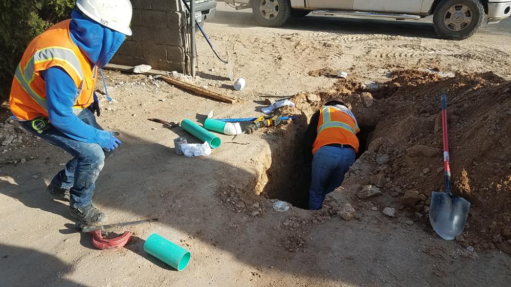 A crew connects the first wastewater line in the Montana Vista community in El Paso County in 2020. Image courtesy of El Paso Water